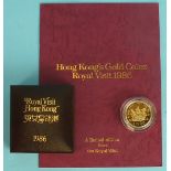 A Hong Kong $1000 gold coin for the Royal visit 1986, cased, with booklet.