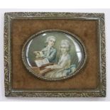 A late 19th century oval miniature of a pianist and flautist, 8 x 6cm in bronzed rectangular