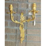 A pair of gilt metal wall light fittings in the French taste, 45cm high, (2).