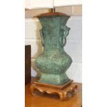 A modern verdigris bronze table lamp in the form of a Chinese archaic vase on wood base, vase 35cm