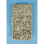 A small 19th century Chinese ivory card case, finely-carved with figures and garden scenes, 4.7 x