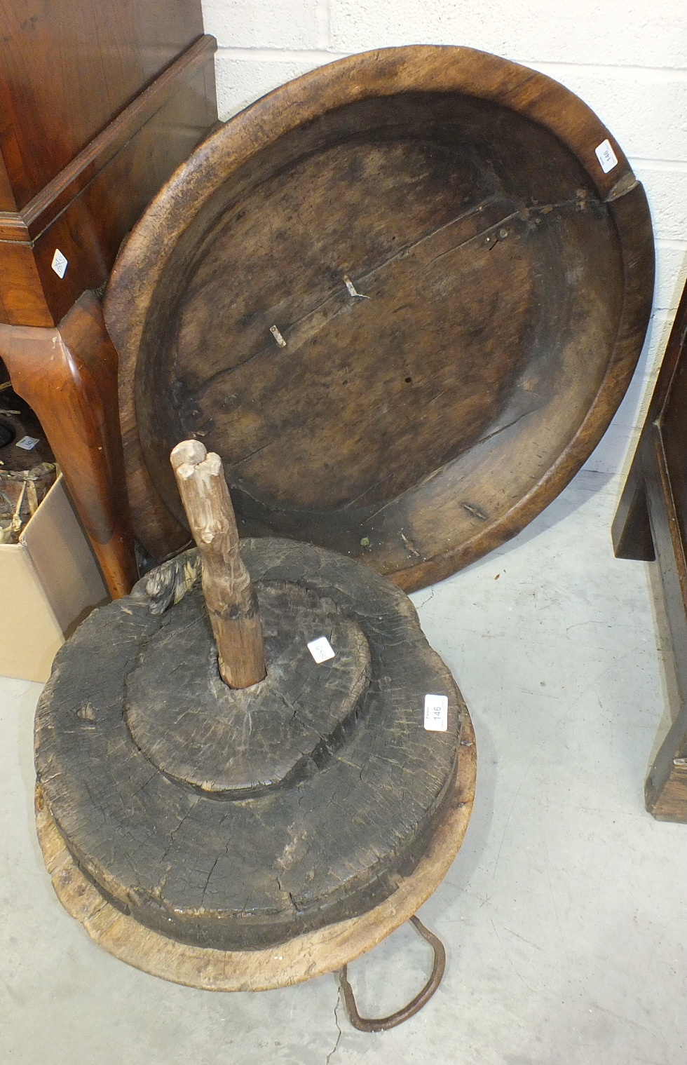 Two Eastern turned wood food bowls with metal carrying handles, 77cm diameter and 49cm diameter - Image 2 of 2