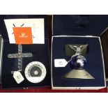 A Swarovski "Cross of Light" and a "Crystal Planet Vision 2000", both boxed. (2)