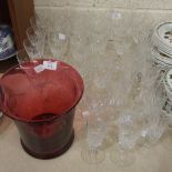 A cranberry glass vase, 21cm high, 20.5cm diameter and a collection of 'Stuart' wine glasses and