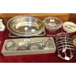 A plated toast rack, entrée dishes and other plated ware.