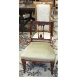 An early-20th century walnut frame prie-dieu-style upholstered-seat-and-back chair and an