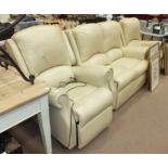 A modern cream leather two-seater settee, matching chair and electric reclining chair, (complies