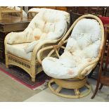 A rattan conservatory suite, comprising a two-seater settee, two armchairs, a swivel chair and a