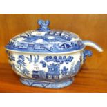 A Ridgways 'Semi China' blue and white willow pattern tureen and cover, with ladle, 28cm wide,