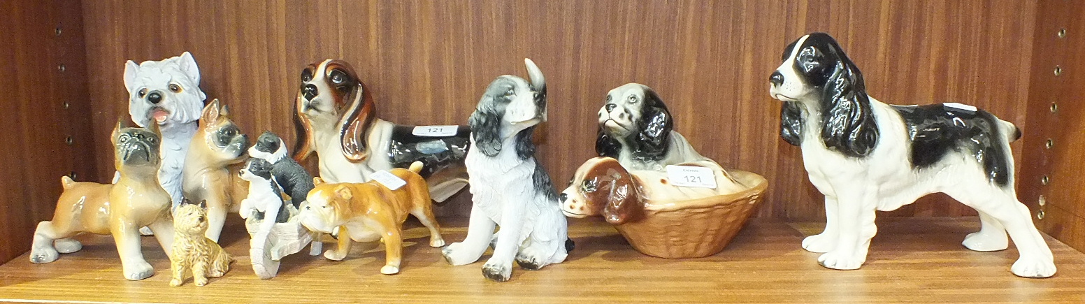 Ten various ceramic and composite dog ornaments, (10).