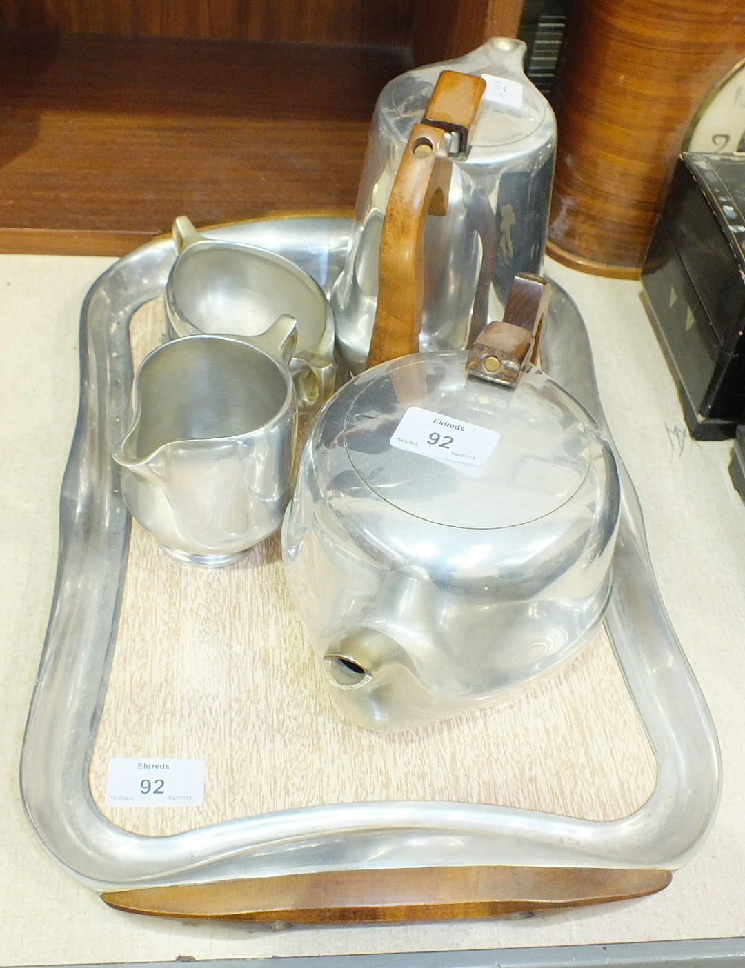 A picquot ware four-piece tea service on tray.