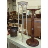 A painted wood plant stand, the circular top on twist column and shaped feet united by an undertier,