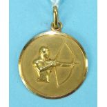 A yellow gold Sagittarius pendant, 2.5cm diameter, with indistinct marks, 8.5g.