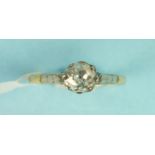 A solitaire diamond ring claw set an old brilliant cut diamond of approximately 0.6cts in 18ct