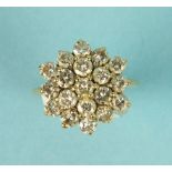 A diamond cluster ring, claw set nineteen brilliant cut diamonds in 18ct gold mount, size K 1/2,