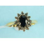 An 18ct gold sapphire and diamond cluster ring, size M, 4.5g.