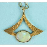 A modern 9ct gold pendant set opal, on 9ct gold chain, total weight 4.3g.