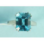 A modern 18ct white gold dress ring set a blue topaz of approx 5.7cts, size O, 5.1g.