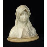 An alabaster bust of a young woman wearing a hooded cape, on plinth, 36cm high, 34cm wide.