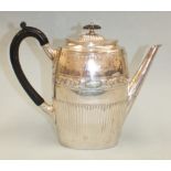 A Victorian oval half-fluted coffee pot, London 1887, inscribed 'To C Fuller from Princes Edward and