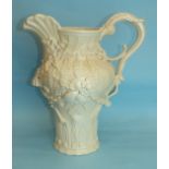 A large Peter Weldon Staffordshire creamware jug with moulded shells and leaf decoration in