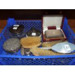 Two glass dressing table pots with silver covers, a five-piece silver and enamel dressing table