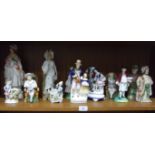 A collection of twelve various ceramic figures, including nodding head and Staffordshire, (some a/