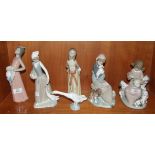 A collection of six Lladro figures, 'Young girl with three Dalmation puppies', 20cm high, 'Young