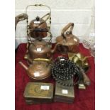 Two Queen Mary brass Christmas 1914 boxes, three copper kettles, a brass shovel with turned wood