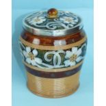 A Doulton stoneware silver-mounted tobacco jar and lid with ribbed and floral decoration within a