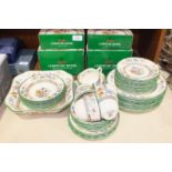 Sixty-three pieces of Spode 'Chinese Rose' pattern tea, dinner and dessert ware, (63).