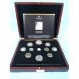 The London Mint Office, 'The King George VI 1937 Coronation Coin and Stamp Set', including eleven