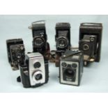 Four folding cameras and two Brownie box cameras, some cased, (6).
