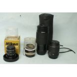 A Nikon EL-Nikkor 1:2.8 50mm no.925500 lens in plastic case and box, two Pentax lenses: SMC Pentax-M