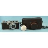 A Leica IIIA camera c1938, numbered 291663, chrome, with Elmar 1:35 50mm lens, in leather case.
