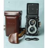 Rolleiflex Model T3 TLR camera with Syncho-compur X shutter, 75mm lens SN:2319667 with lens cap