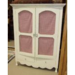 A Laura Ashley white-painted two-door cupboard, the chicken-wire doors and shelved interior above