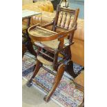 An Edwardian child's stained wood metamorphic high chair.