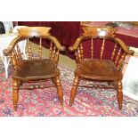 A pair of stained beech and elm 'Captain's' chairs with turned supports and legs, (2).