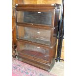 An oak Globe Wernicke three-section bookcase, 86cm wide, 132cm high.