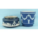 A Wedgwood jasperware jardinière decorated with classical figures and trailing vines, 19cm high,