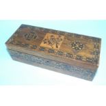 A Tunbridge ware glove box of oblong shape, the top decorated with a finch and overall parquetry