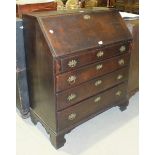 A George III mahogany fall-front bureau, with fitted interior above four long graduated drawers,