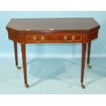 A late-19th century mahogany tea table, the square fold-over top with canted corners and reeded