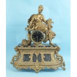 A spelter and marble mantel clock with Paris-made circular drum movement striking on a bell,