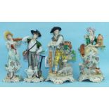 A pair of early-20th century Continental porcelain figurines of a shepherd and a shepherdess and a