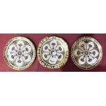 A Royal Crown Derby circular dish with shaped rim decorated in full Imari colours and a pair of