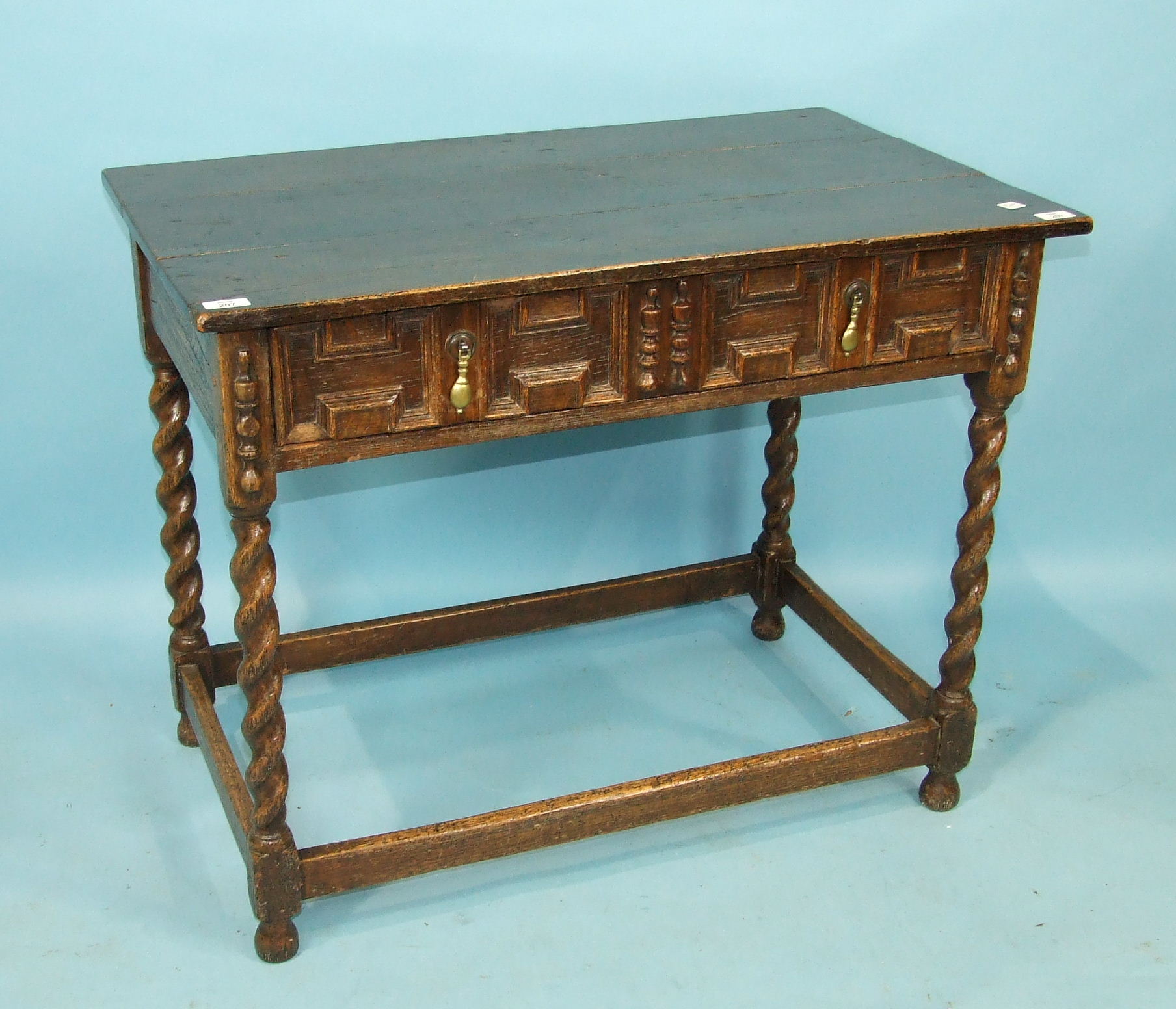 An antique oak rectangular side table in the 17th century style, having a single frieze drawer, on - Image 2 of 3