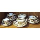 A set of three Royal Crown Derby large Imari pattern cups and saucers, a smaller cup and saucer