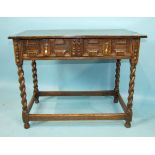 An antique oak rectangular side table in the 17th century style, having a single frieze drawer, on